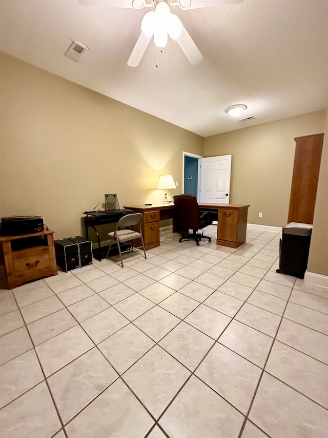 office area with ceiling fan and light tile patterned floors