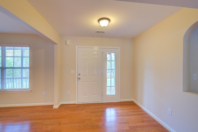 foyer with light hardwood / wood-style flooring