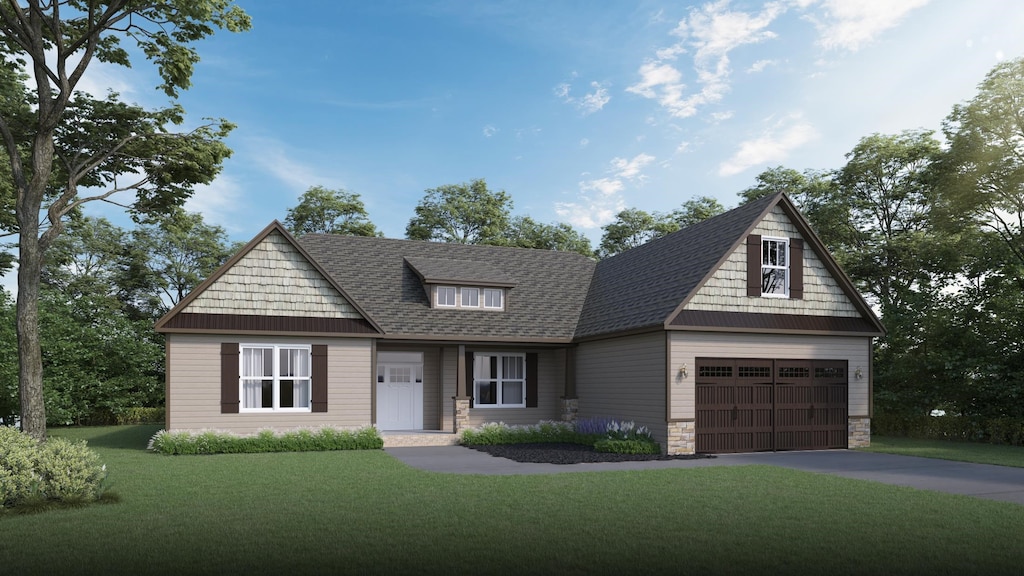 view of front facade with a garage and a front yard