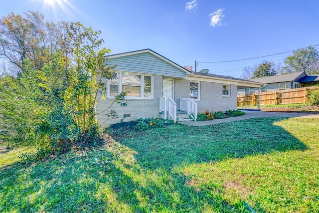 view of front of home with a front lawn