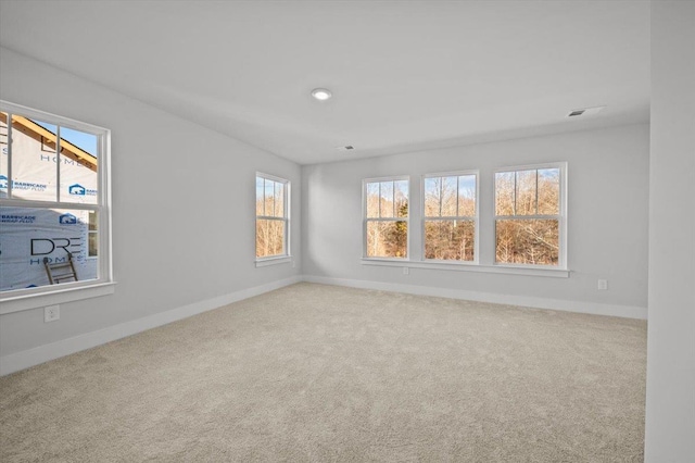 view of carpeted spare room