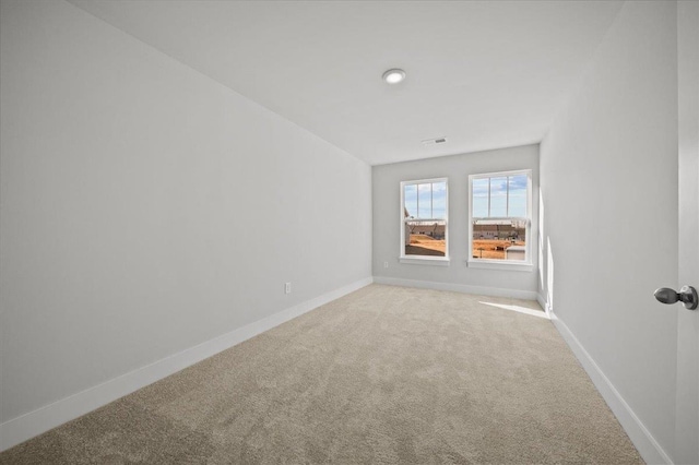 view of carpeted spare room