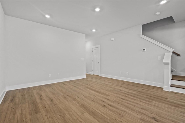 unfurnished living room with light hardwood / wood-style flooring