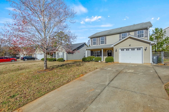 view of front of property with a front lawn and a garage