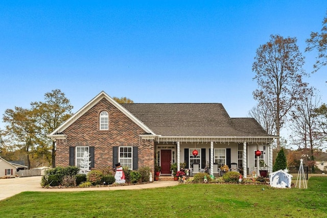 view of front facade with a porch and a front lawn