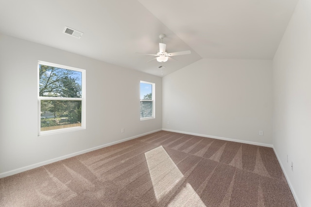 unfurnished room with carpet, ceiling fan, and lofted ceiling