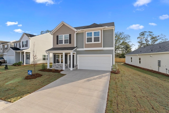 view of front of property with a porch, a garage, and a front lawn