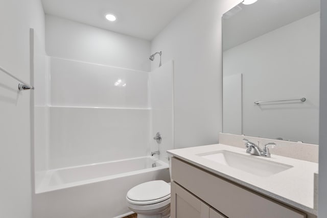 full bathroom with vanity, bathtub / shower combination, and toilet