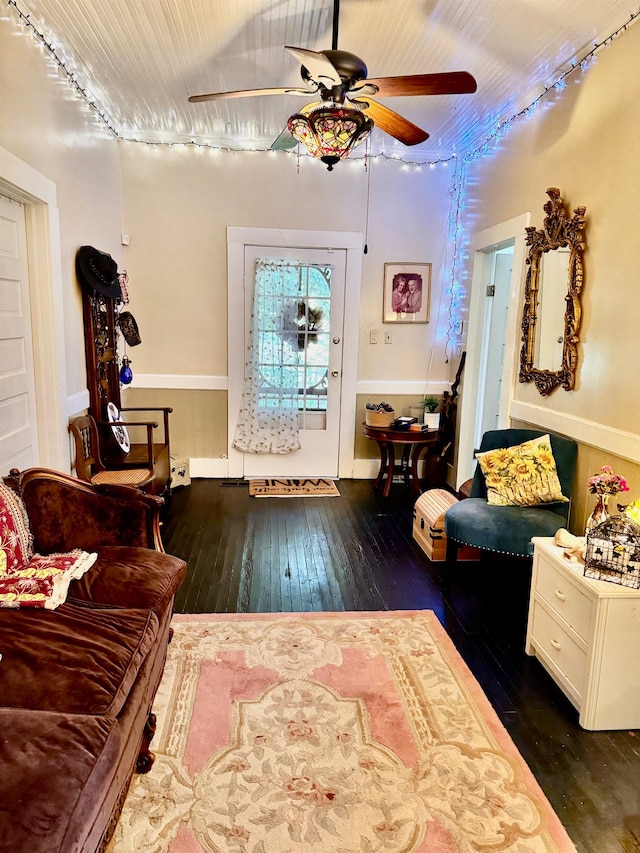 foyer entrance featuring dark hardwood / wood-style floors and ceiling fan