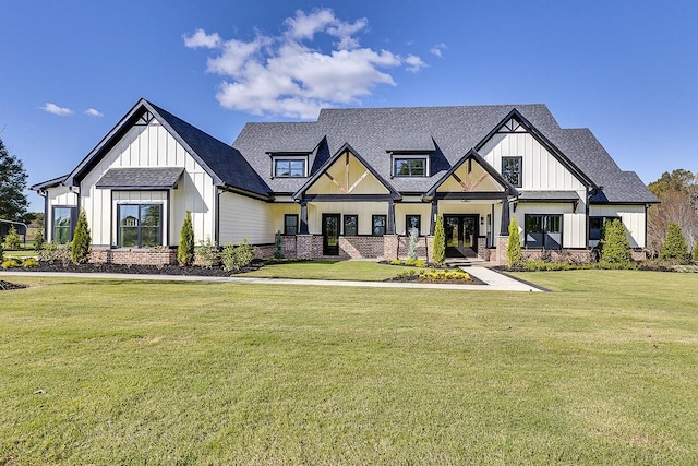 modern inspired farmhouse with a front yard