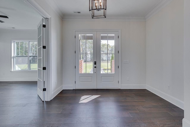 doorway to outside featuring french doors, dark hardwood / wood-style flooring, and crown molding