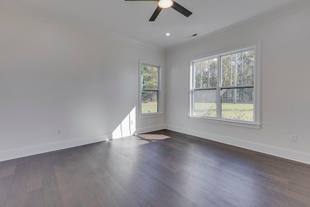 spare room featuring ceiling fan, dark hardwood / wood-style flooring, and crown molding