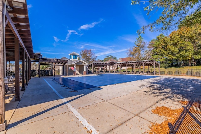 view of pool with a pergola