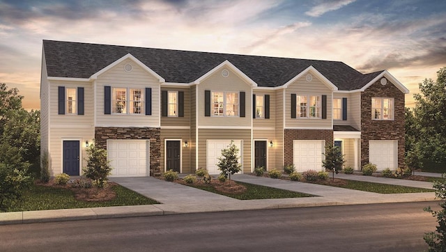 view of front of property with a garage