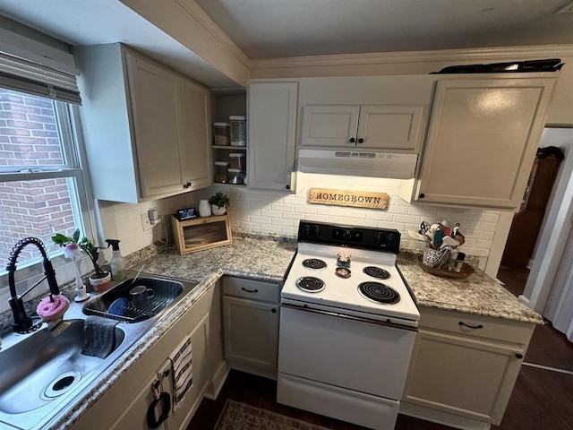 kitchen featuring white electric stove, under cabinet range hood, a sink, open shelves, and tasteful backsplash