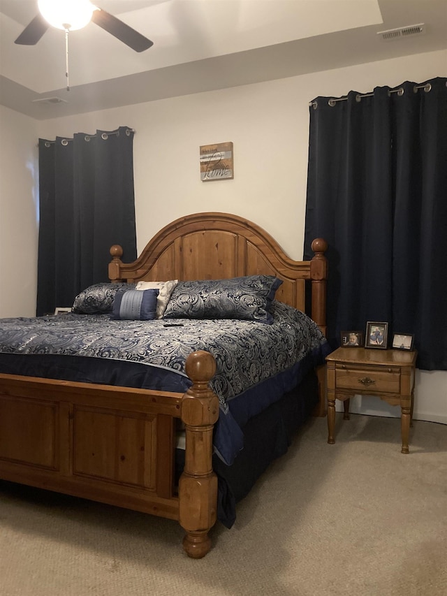 carpeted bedroom featuring ceiling fan