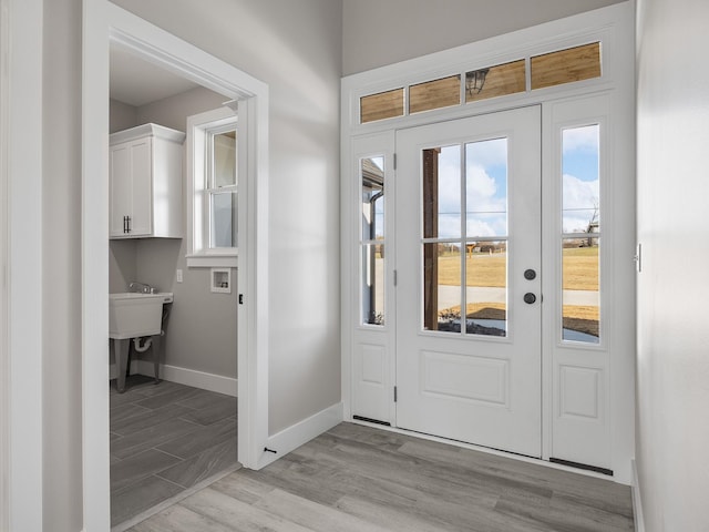 foyer entrance featuring light hardwood / wood-style floors