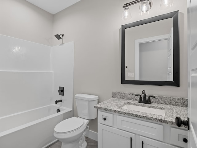 full bathroom featuring washtub / shower combination, vanity, and toilet