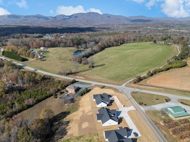 drone / aerial view featuring a mountain view