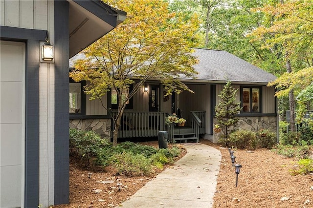 property entrance featuring covered porch