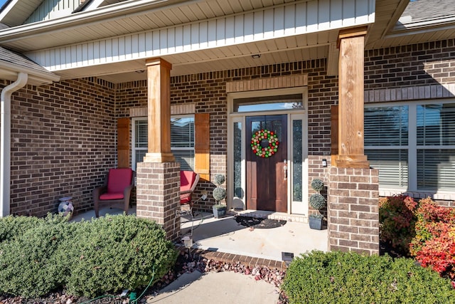 property entrance featuring covered porch