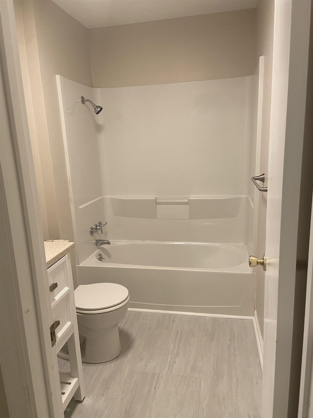 full bathroom featuring vanity, shower / bathing tub combination, and toilet