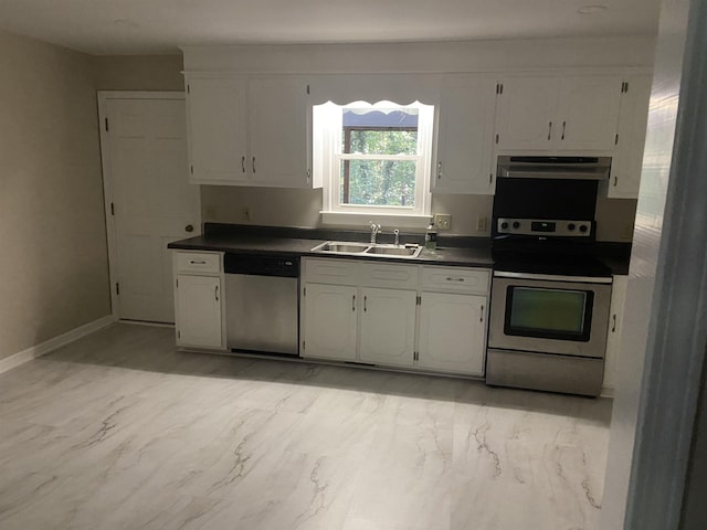 kitchen featuring white cabinets, exhaust hood, sink, and appliances with stainless steel finishes