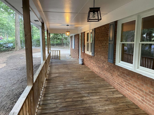 wooden terrace with covered porch