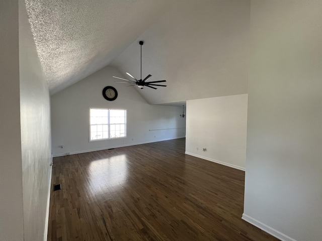 interior space featuring a textured ceiling, dark hardwood / wood-style flooring, vaulted ceiling, and ceiling fan