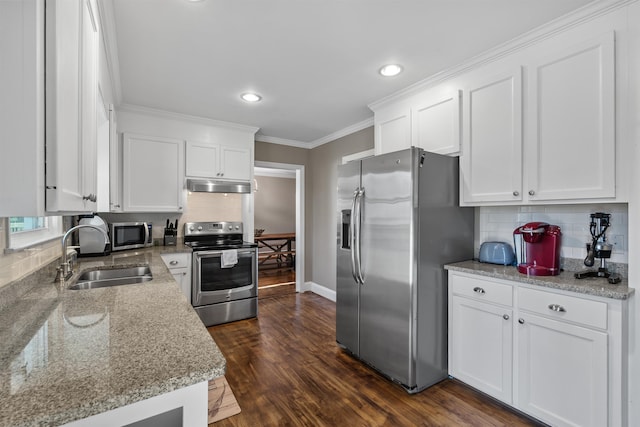 kitchen with white cabinets, appliances with stainless steel finishes, and sink