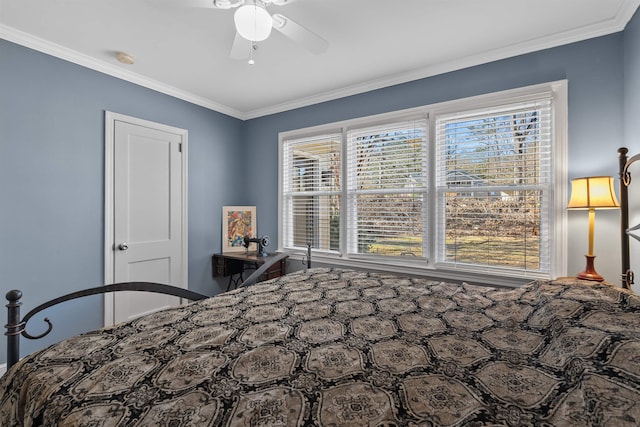 unfurnished bedroom with ceiling fan and ornamental molding