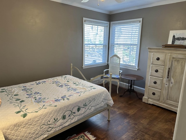 bedroom featuring ceiling fan, crown molding, and dark hardwood / wood-style floors