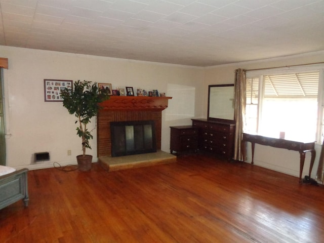 unfurnished living room with hardwood / wood-style floors and a fireplace