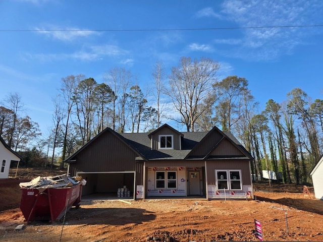 view of front facade featuring a garage and a porch