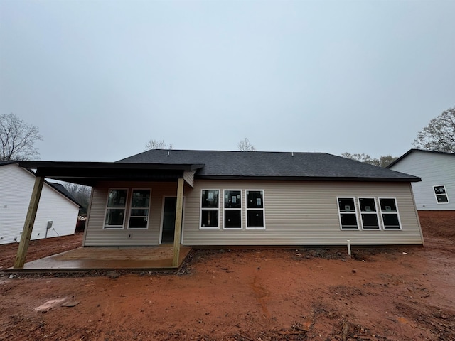 back of house with a patio area