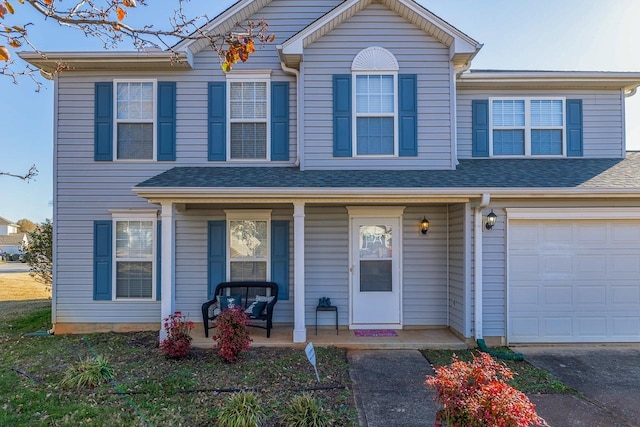 view of front of property with a garage