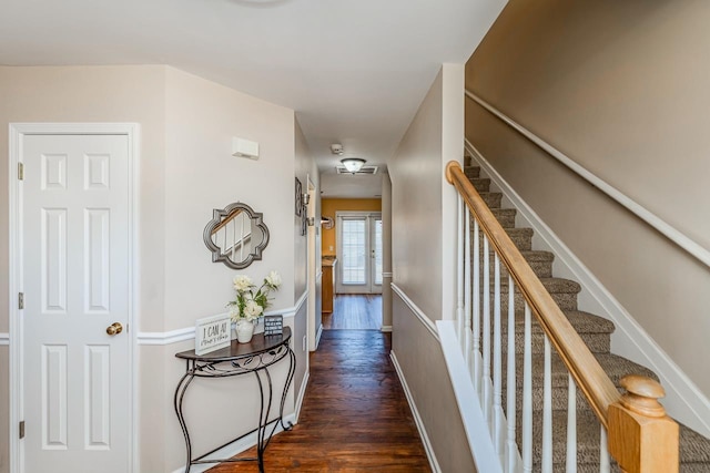 hall with dark hardwood / wood-style flooring