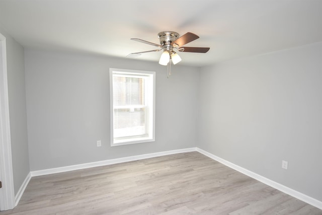 unfurnished room featuring ceiling fan and light hardwood / wood-style flooring