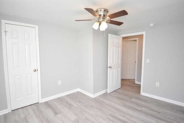 unfurnished room with ceiling fan and light hardwood / wood-style flooring