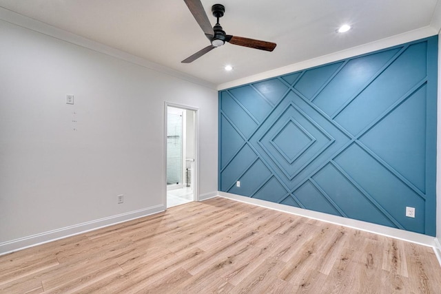 unfurnished room featuring light wood-type flooring, ceiling fan, and ornamental molding