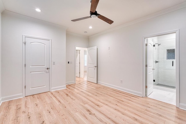 unfurnished bedroom featuring ensuite bathroom, light hardwood / wood-style flooring, ceiling fan, and crown molding