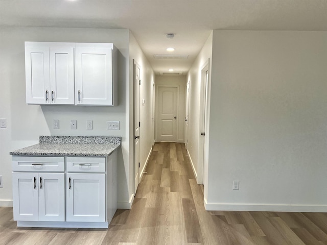 hall featuring light hardwood / wood-style floors