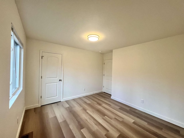 empty room with light wood-type flooring