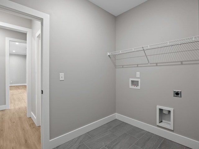 laundry room with washer hookup, hardwood / wood-style floors, and electric dryer hookup