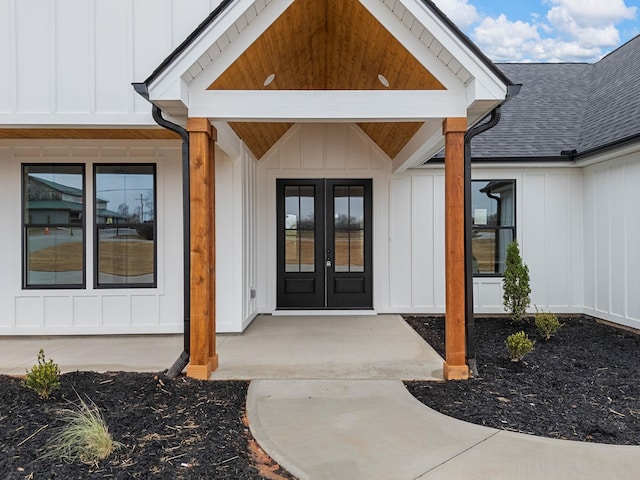 property entrance featuring french doors