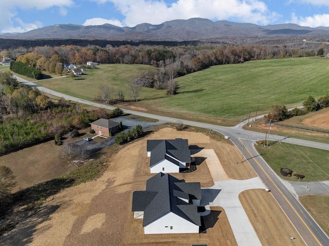 drone / aerial view featuring a mountain view