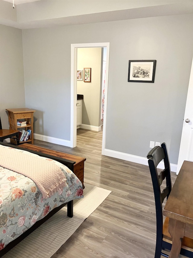 bedroom featuring hardwood / wood-style floors