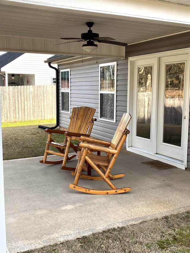 view of patio featuring ceiling fan