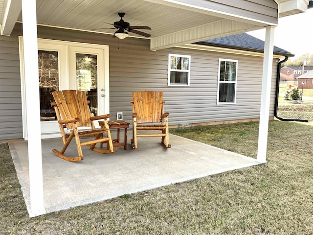 view of patio featuring ceiling fan