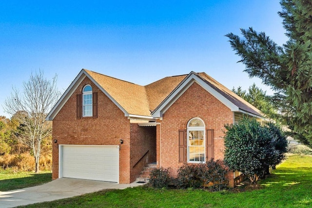 view of front facade with a front lawn and a garage